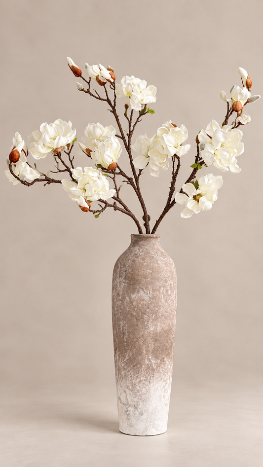 Maggie faux creamy blossom arrangement in a textured ombre vase